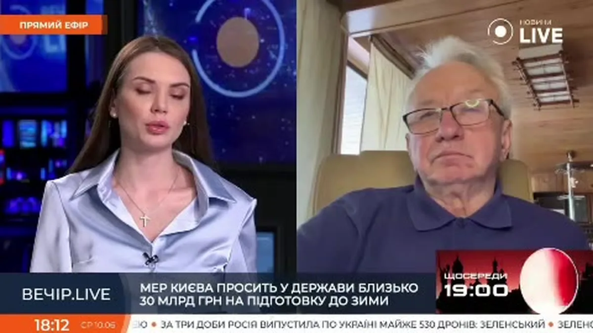 Телевізійна трансляція розмови двох людей про тарифи на воду в Україні